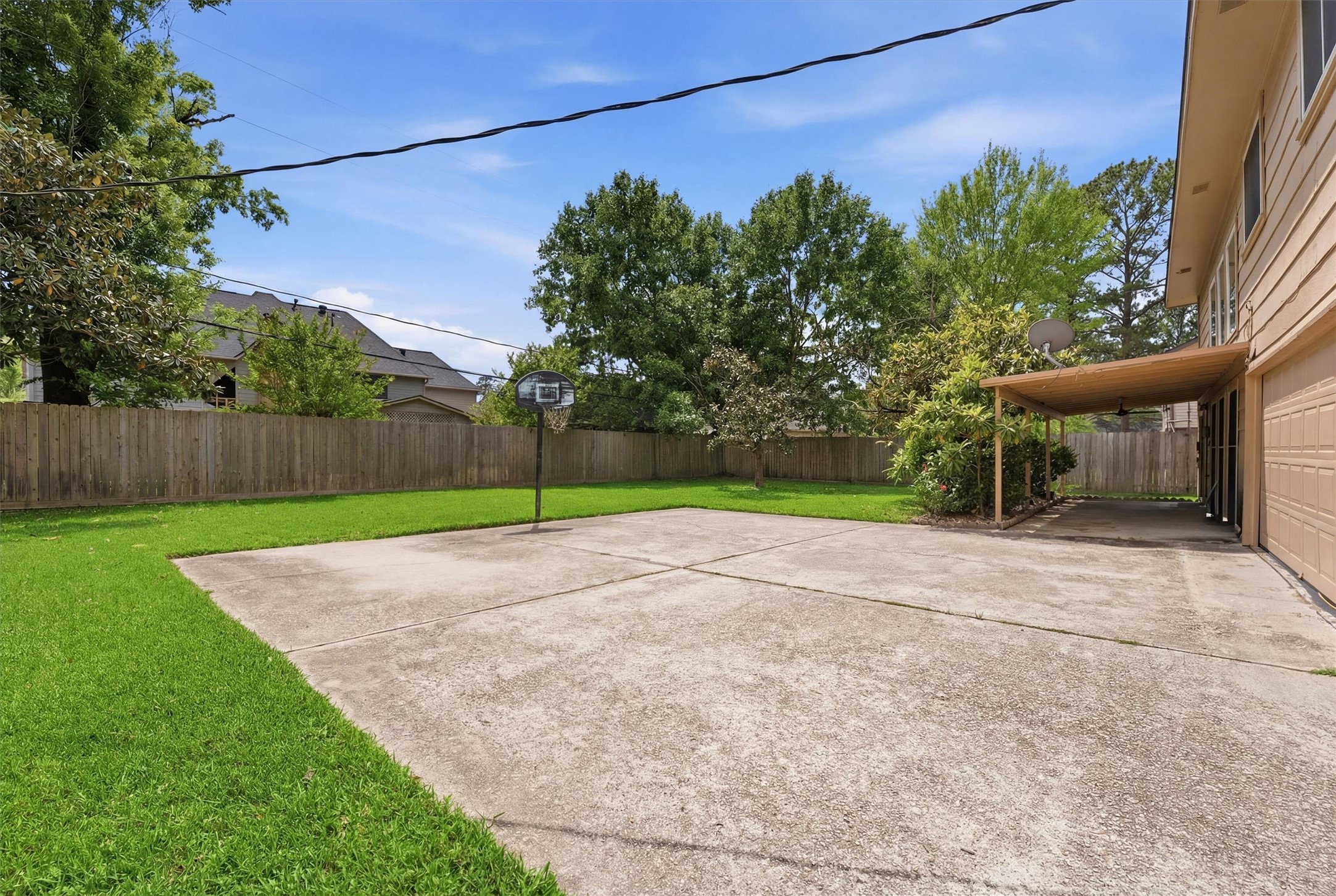 8115 Theisswood Road Spring, TX 77379 - Photo 30 of 36 a view of a house with a yard