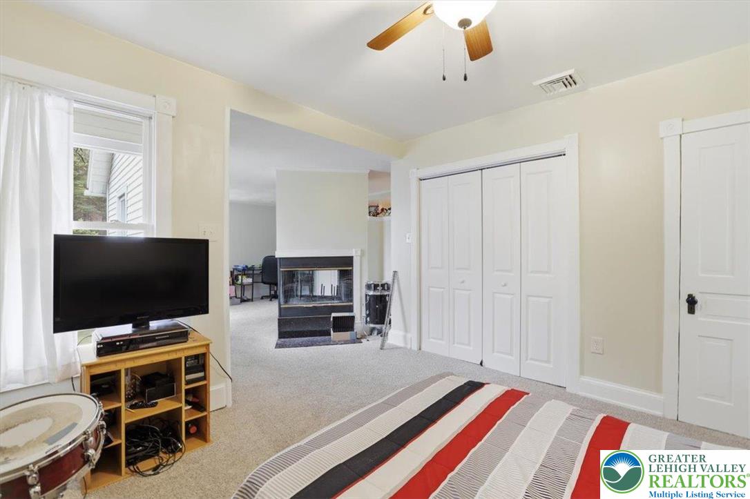 3585 Fairyland Road Lehighton, PA 18235 - Photo 44 of 57 a room with furniture and a flat screen tv