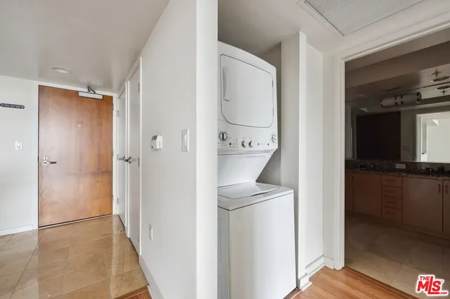 a view of bathroom with a toilet shower and mirror
