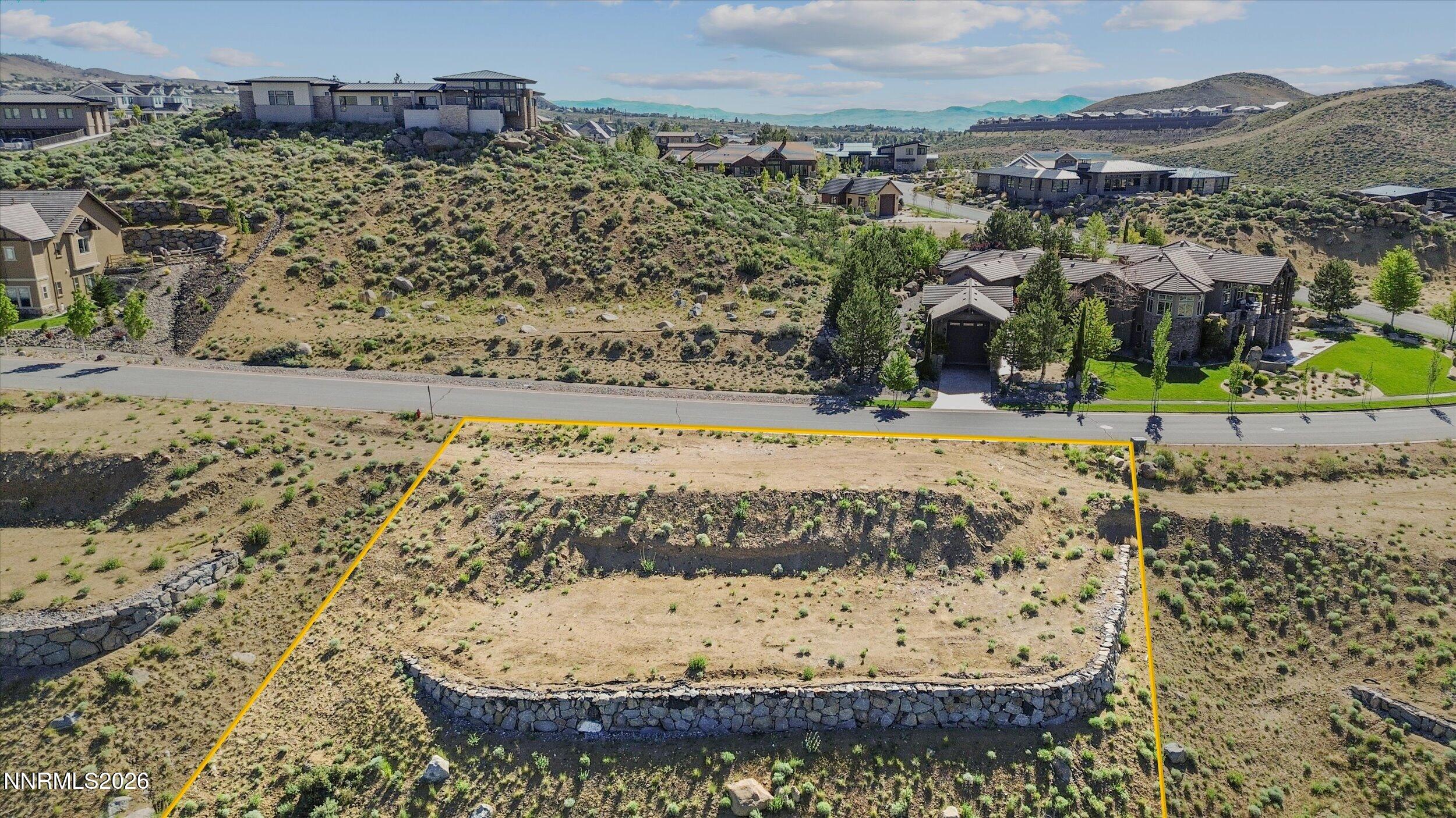 1705 Boulder Ridge Court Reno, NV 89523 - Photo 7 of 10 a view of a yard with wooden fence