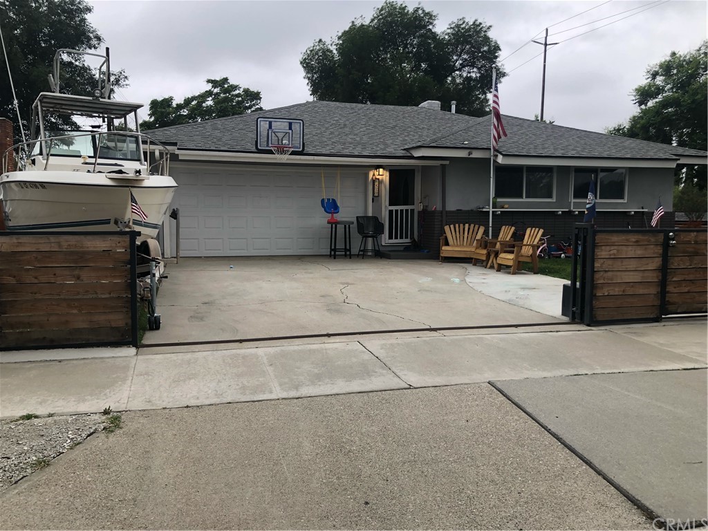 6417 Juanro Way Riverside, CA 92504 - Photo 1 of 1 a view of a car park in front of house
