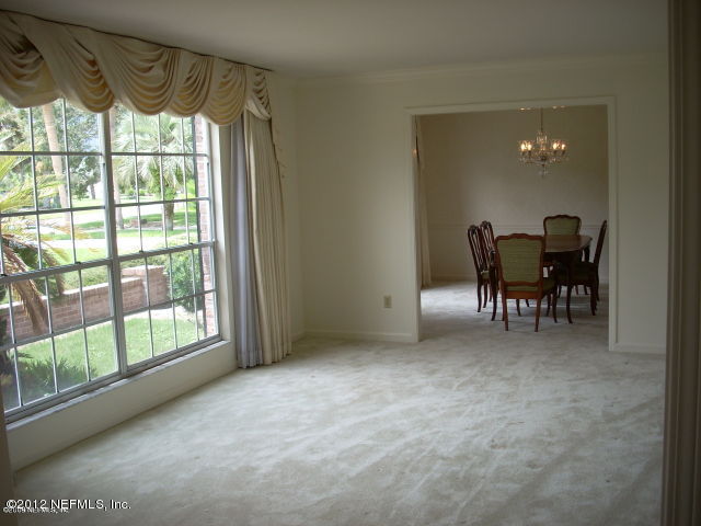 319 Pablo Road Ponte Vedra Beach, FL 32082 - Photo 2 of 4 a view of a livingroom with furniture window and outside view