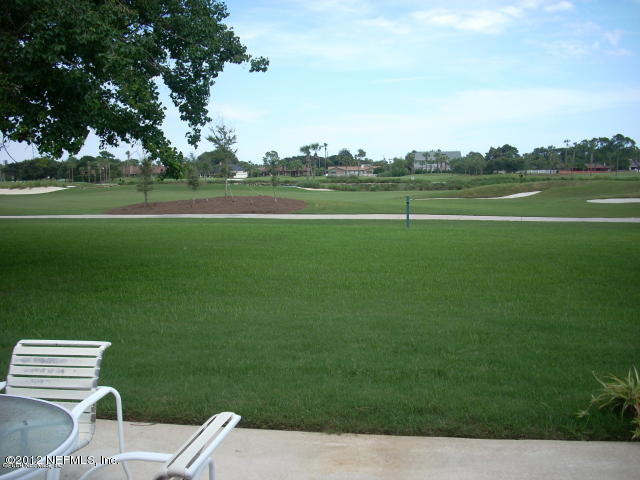 319 Pablo Road Ponte Vedra Beach, FL 32082 - Photo 4 of 4 a view of outdoor space with green field and trees