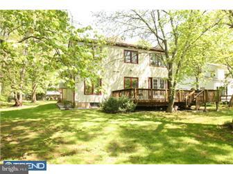 217 Terhune Road Princeton, NJ 08540 - Photo 10 of 12 a view of a big yard with a house