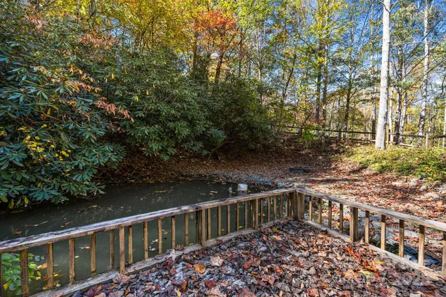 a kitchen with stainless steel appliances granite countertop a refrigerator sink and cabinets