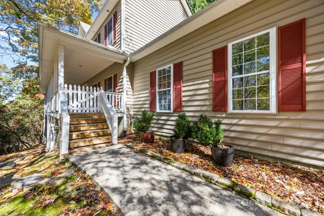 a view of balcony with wooden floor