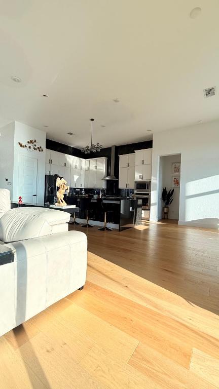 20721 Dustin Lane Pflugerville, TX 78660 - Photo 6 of 27 Living area featuring light wood finished floors