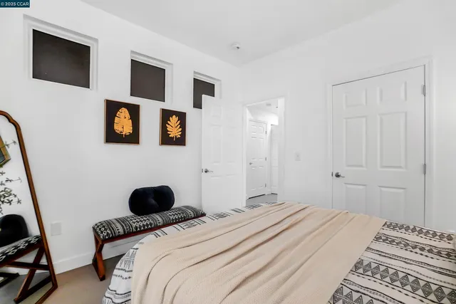 a view of a hallway with closet