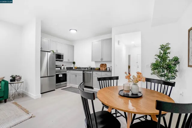 a view of a livingroom with furniture and window