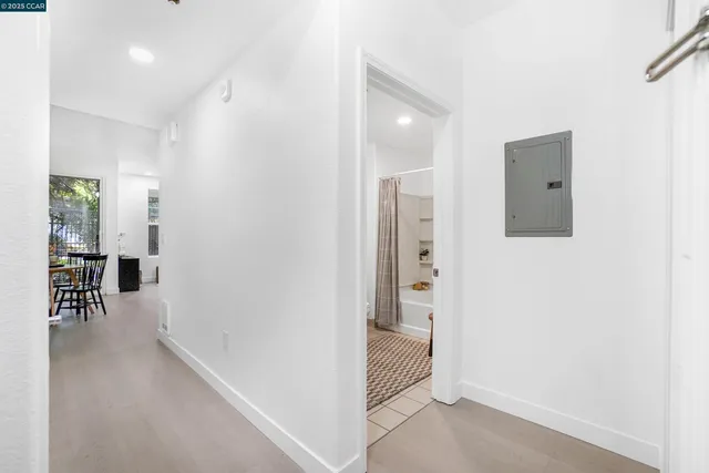a view of a dining room with furniture and window