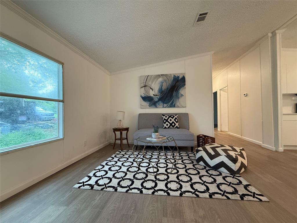 2002 County Road 906 Princeton, TX 75407 - Photo 15 of 31 a living room with a couch