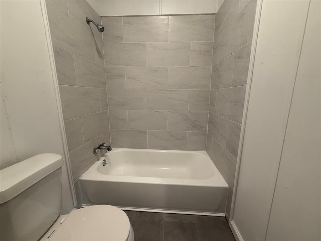 2002 County Road 906 Princeton, TX 75407 - Photo 18 of 31 a bathroom with a sink and a toilet