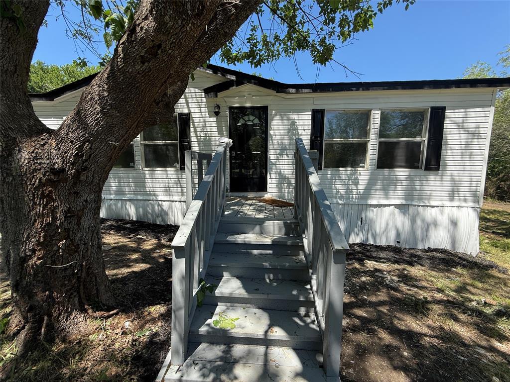2002 County Road 906 Princeton, TX 75407 - Photo 25 of 31 a front view of a house with a yard