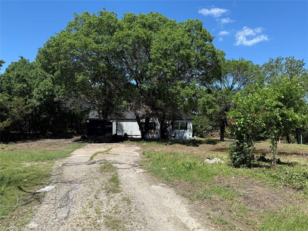 2002 County Road 906 Princeton, TX 75407 - Photo 29 of 31 a front view of a house with a yard