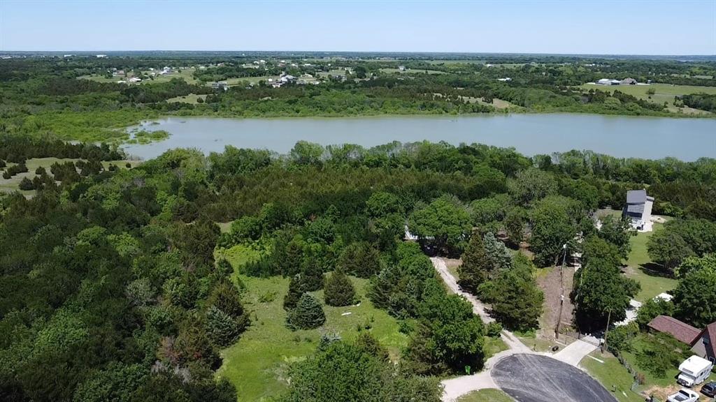 2002 County Road 906 Princeton, TX 75407 - Photo 7 of 31 an aerial view of a residential houses with outdoor space and lake view