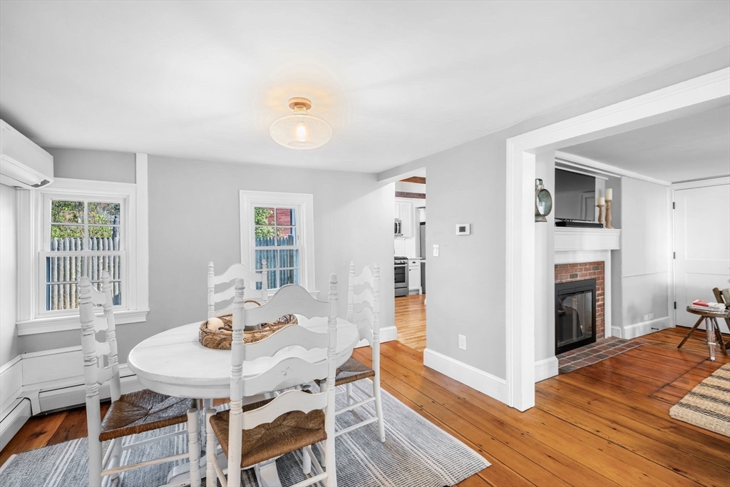20 Summer Street, Unit 20 Ipswich, MA 01938 - Photo 14 of 42 a view of a dining room with furniture window and wooden floor