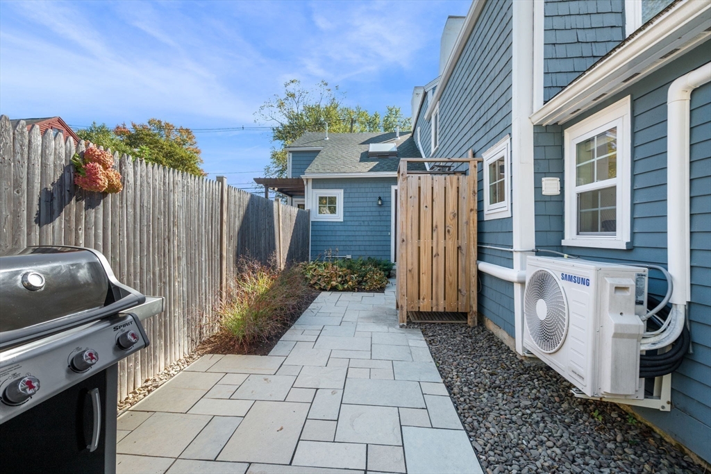 20 Summer Street, Unit 20 Ipswich, MA 01938 - Photo 31 of 42 a view of a house with a backyard