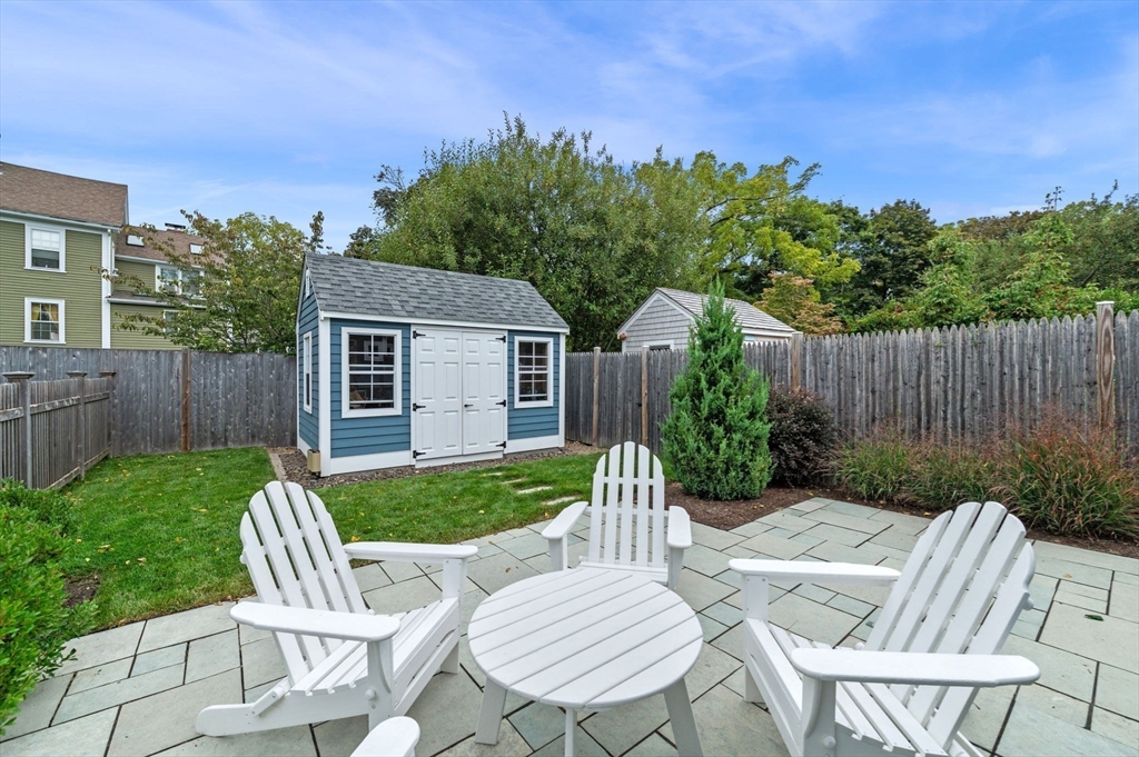 20 Summer Street, Unit 20 Ipswich, MA 01938 - Photo 33 of 42 a view of a patio with a chairs in patio