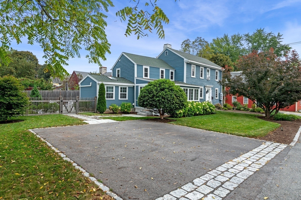 20 Summer Street, Unit 20 Ipswich, MA 01938 - Photo 38 of 42 a front view of house with yard and green space