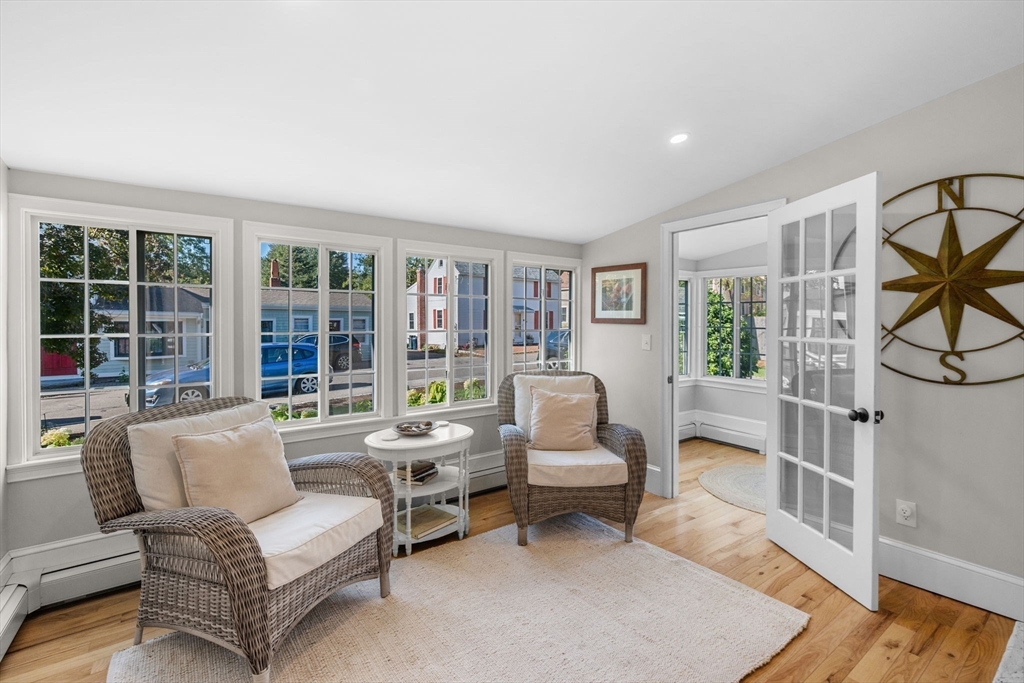 20 Summer Street, Unit 20 Ipswich, MA 01938 - Photo 9 of 42 a living room with furniture and a large window
