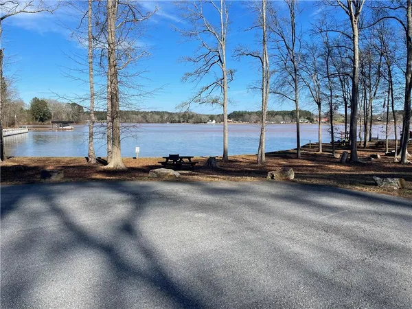 a view of a street with a building in the background