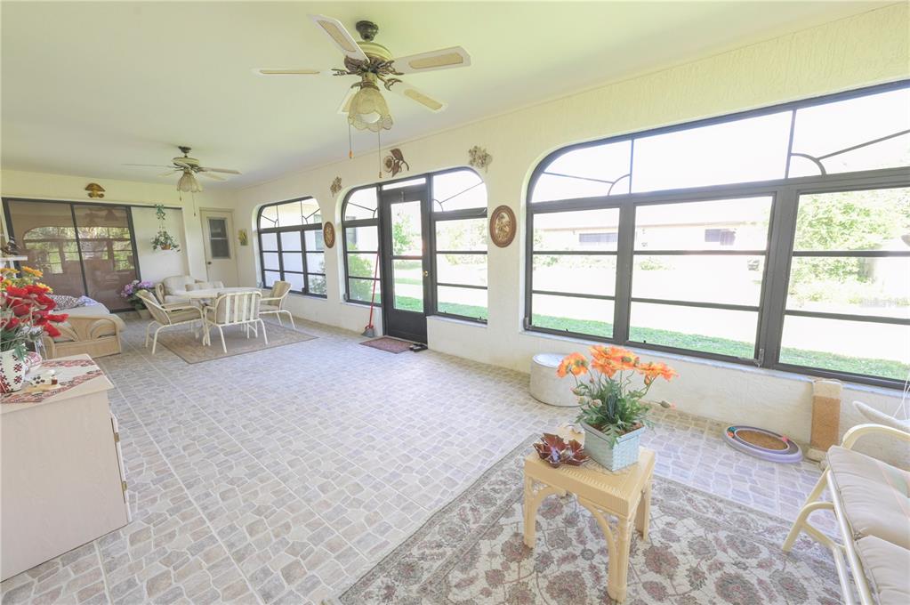 615 Toledo Road North Port, FL 34287 - Photo 15 of 16 a living room with furniture and a large window