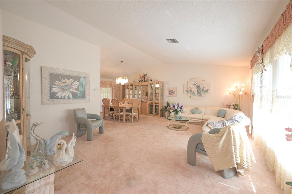 615 Toledo Road North Port, FL 34287 - Photo 5 of 16 a view of a livingroom with furniture and a table