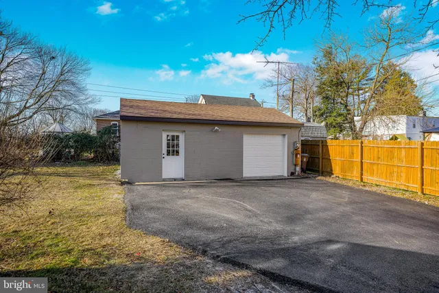 a view of a room with wooden walls
