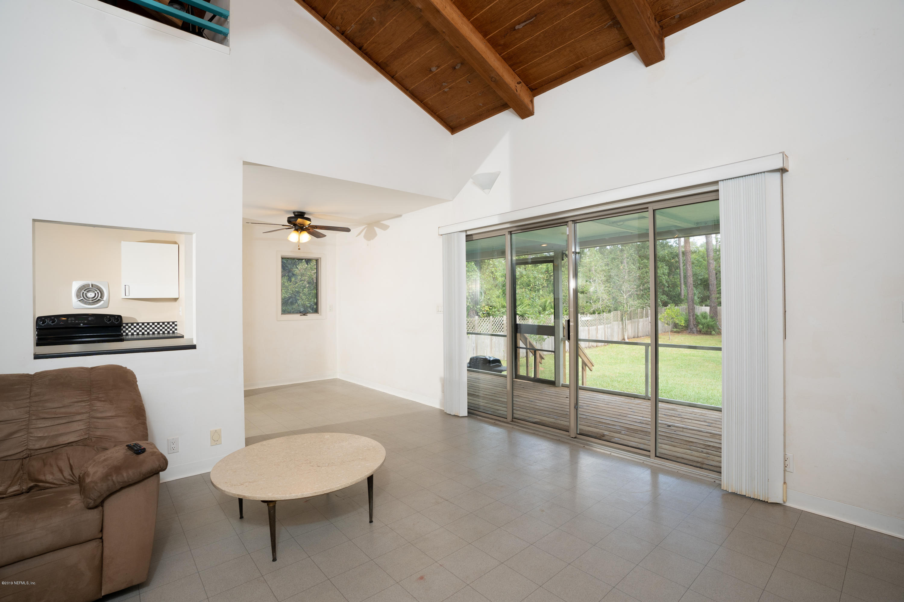 1090 Cherry Tree Road St. Augustine, FL 32086 - Photo 21 of 33 a living room with furniture and a large window