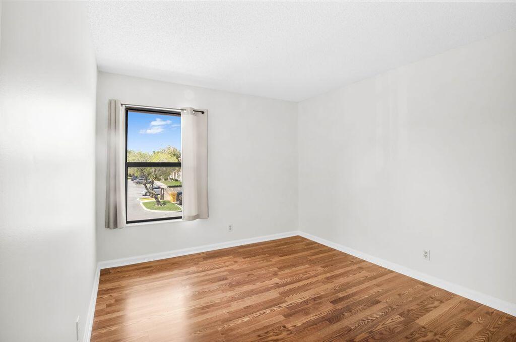 3300 Jaywood Terrace, Unit 2160 Boca Raton, FL 33431 - Photo 22 of 28 an empty room with a window