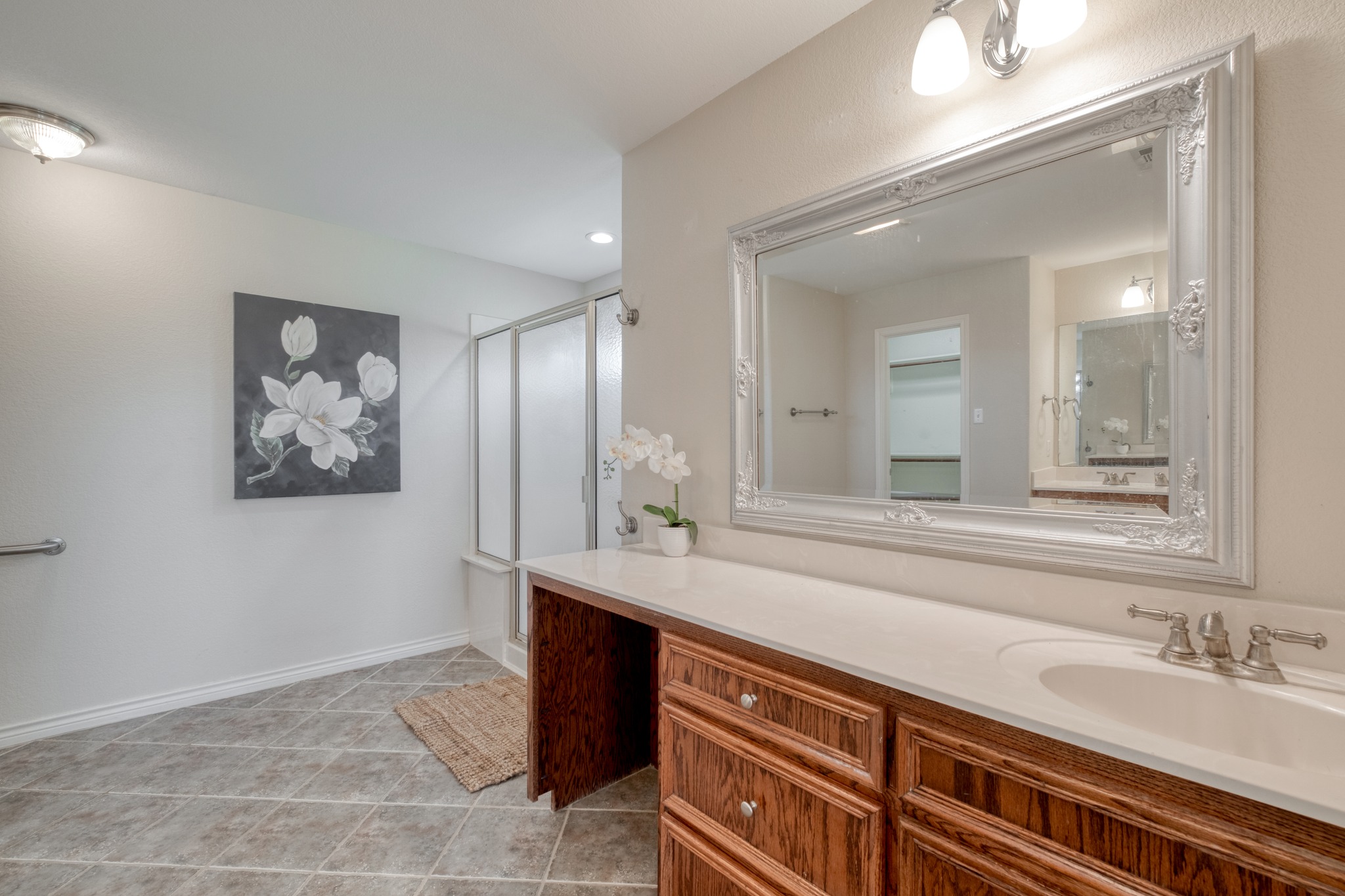 341 Brown Road McDade, TX 78650 - Photo 21 of 38 A refined bathroom features a spacious vanity and a walk-in shower.