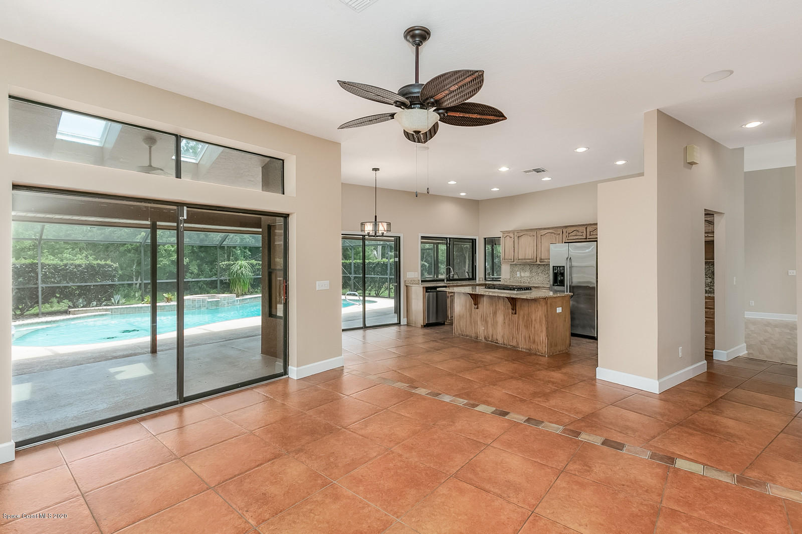 3805 Shady Run Road Melbourne, FL 32934 - Photo 17 of 42 a view of kitchen with refrigerator and window