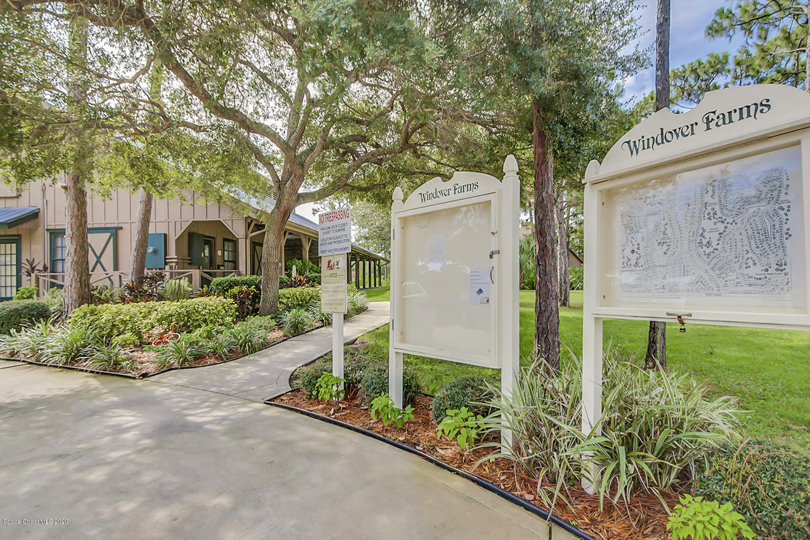 3805 Shady Run Road Melbourne, FL 32934 - Photo 33 of 42 a front view of a house with garden