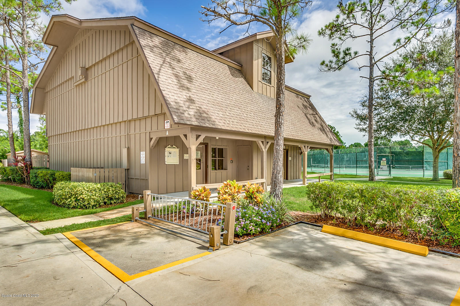 3805 Shady Run Road Melbourne, FL 32934 - Photo 37 of 42 a front view of a house with garden