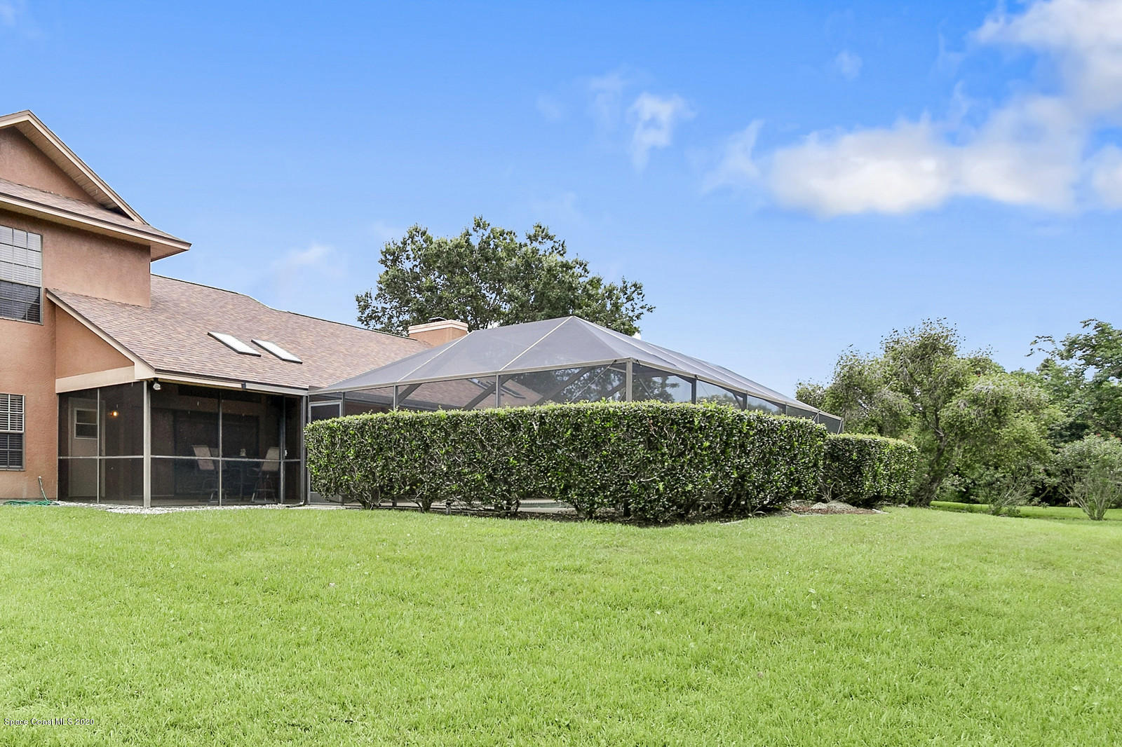 3805 Shady Run Road Melbourne, FL 32934 - Photo 6 of 42 a front view of a house with a yard