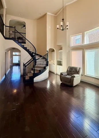 a view of kitchen with furniture and wooden floor