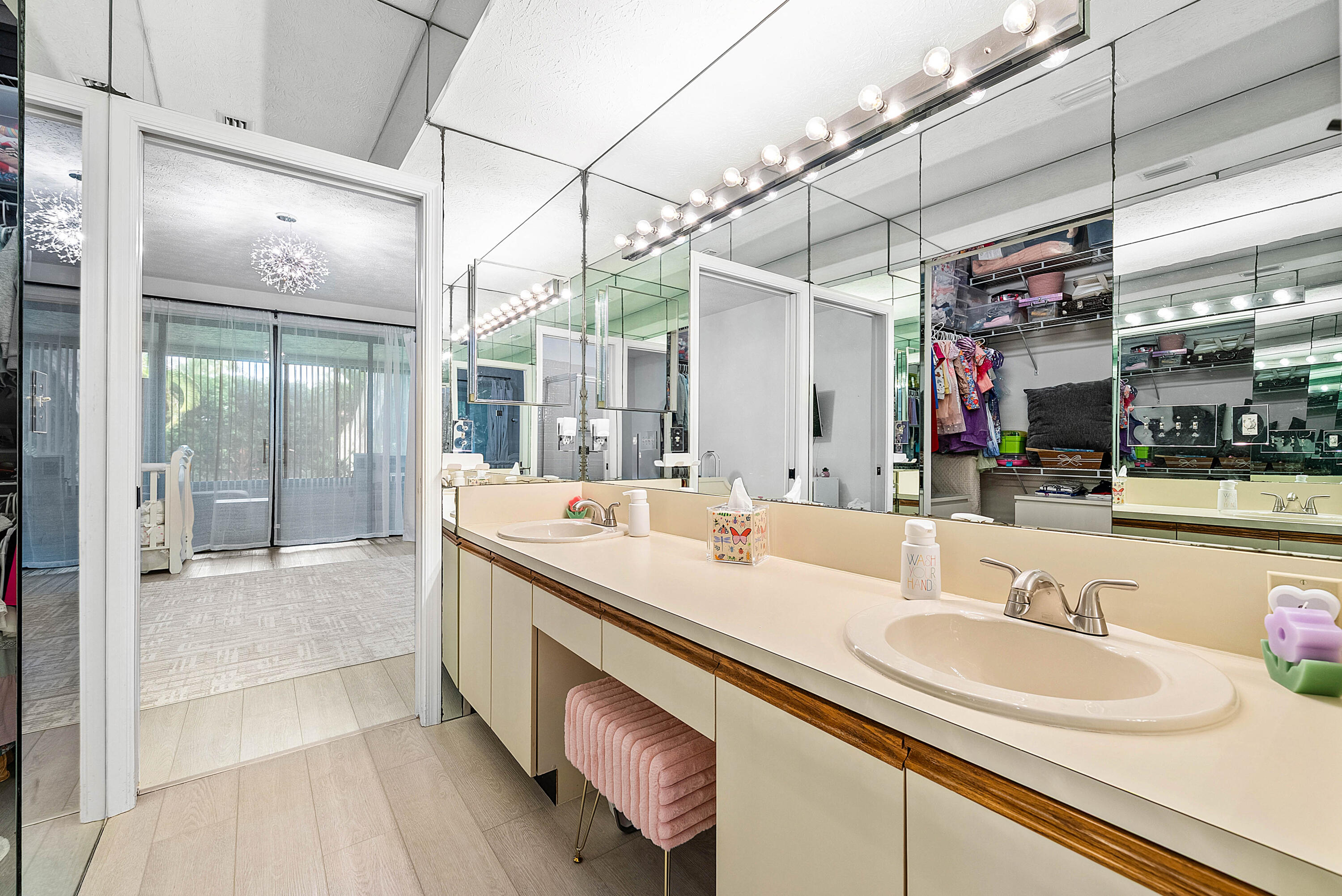 22627 Meridiana Drive Boca Raton, FL 33433 - Photo 26 of 58 a bathroom with a sink double vanity and a shower