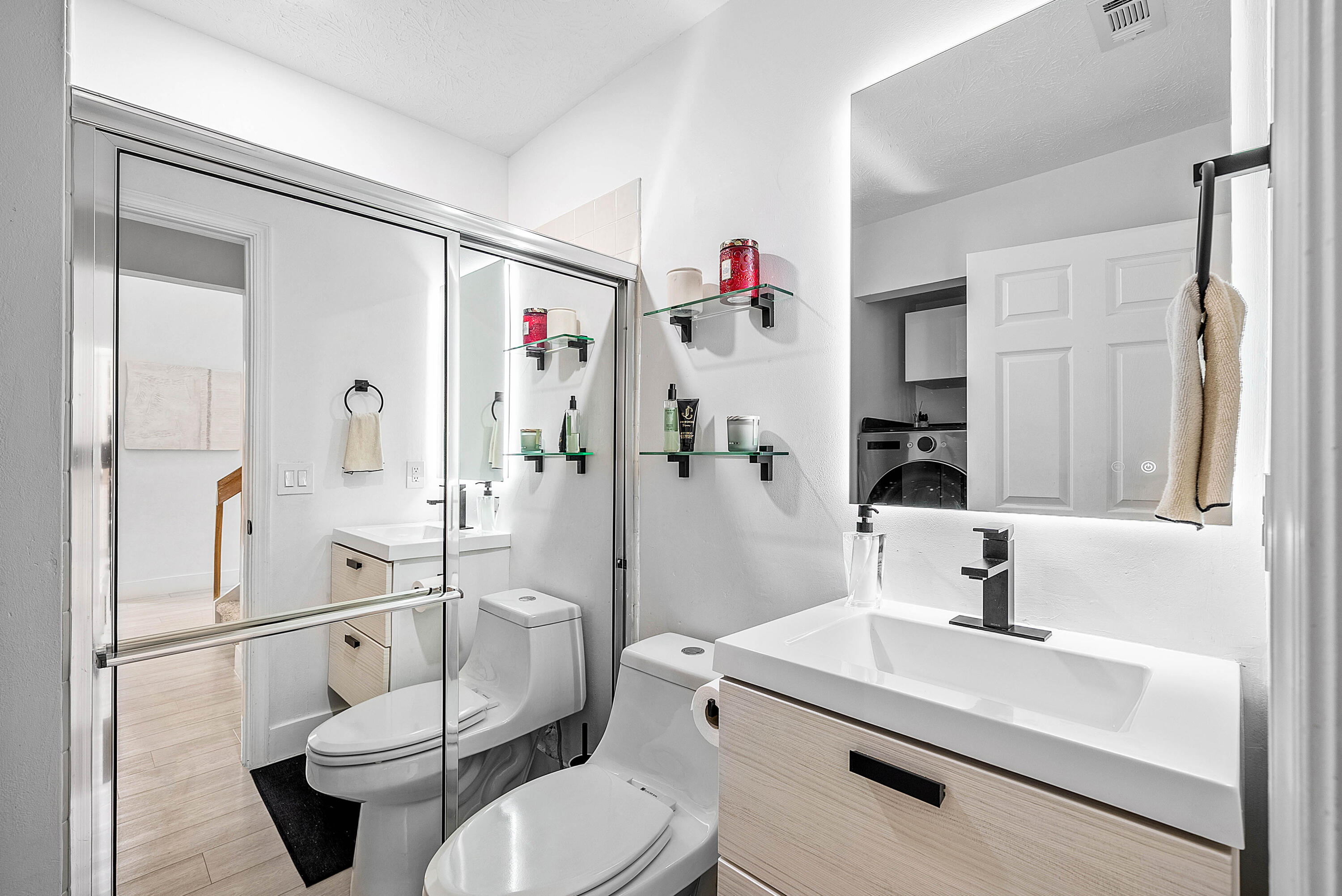 22627 Meridiana Drive Boca Raton, FL 33433 - Photo 35 of 58 a bathroom with a sink a toilet and shower