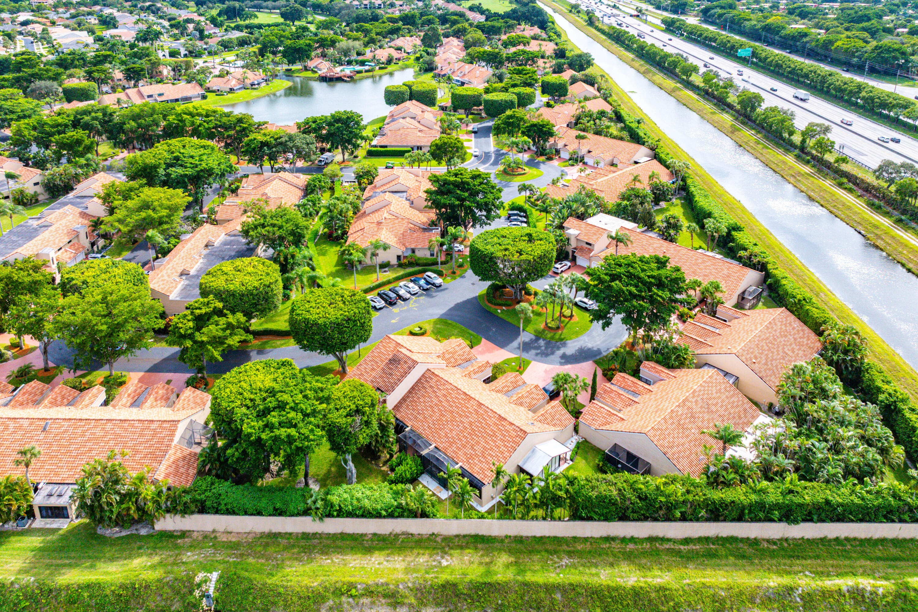 22627 Meridiana Drive Boca Raton, FL 33433 - Photo 53 of 58 an aerial view of residential houses with outdoor space and swimming pool