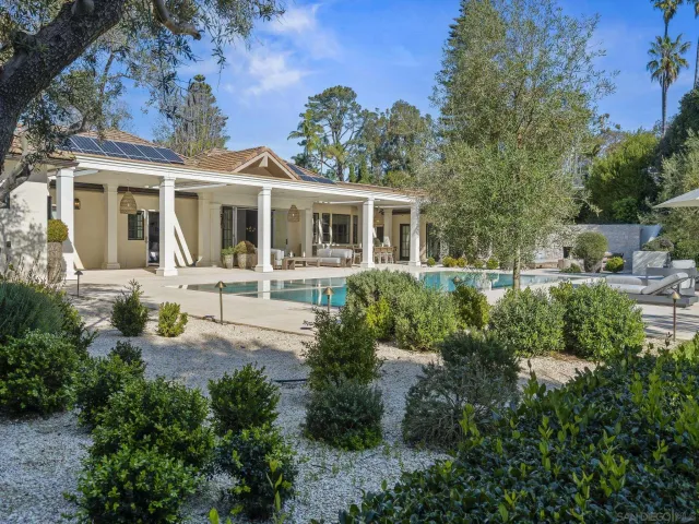 a view of a house with tub and chairs
