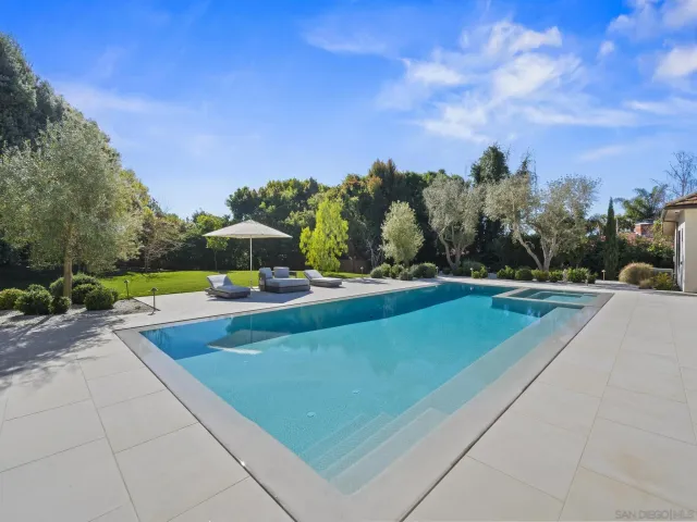 a view of house with outdoor space and seating area