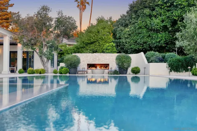 a view of a chairs and table in the patio