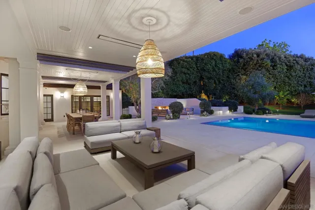 a outdoor living space with furniture and a potted plant