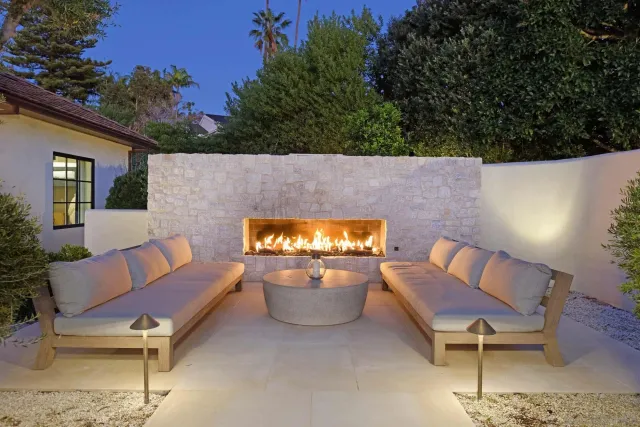 a view of swimming pool with seating space