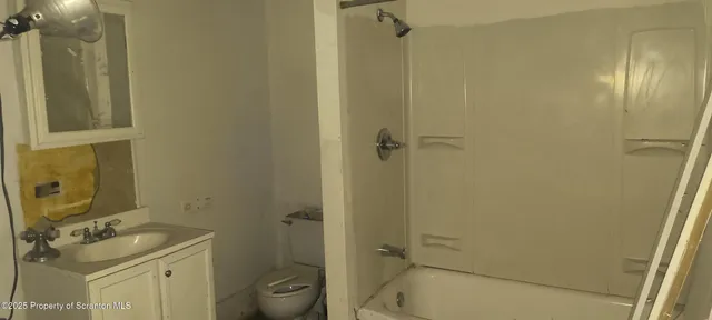 a view of storage and utility room