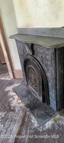 a bathroom with a black white checkered floor
