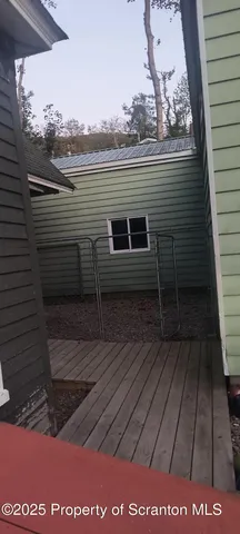 a view of a balcony with an outdoor space