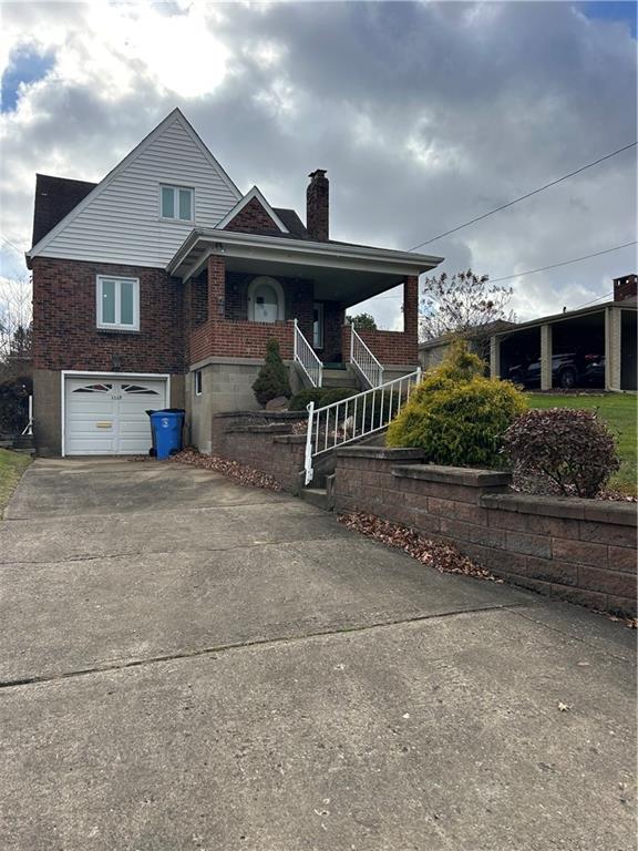 1117 Schweitzer Road McKeesport, PA 15135 - Photo 1 of 8 a front view of a house with a yard