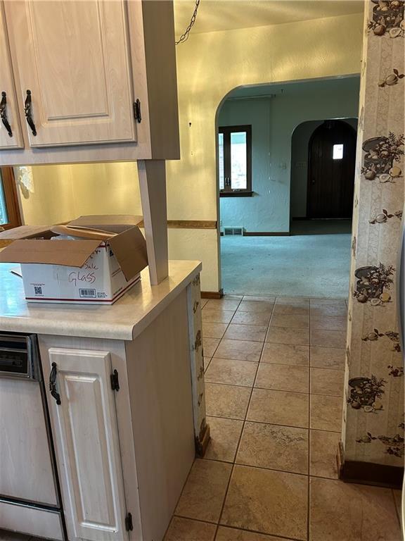 1117 Schweitzer Road McKeesport, PA 15135 - Photo 4 of 8 a kitchen with a sink a stove and cabinets