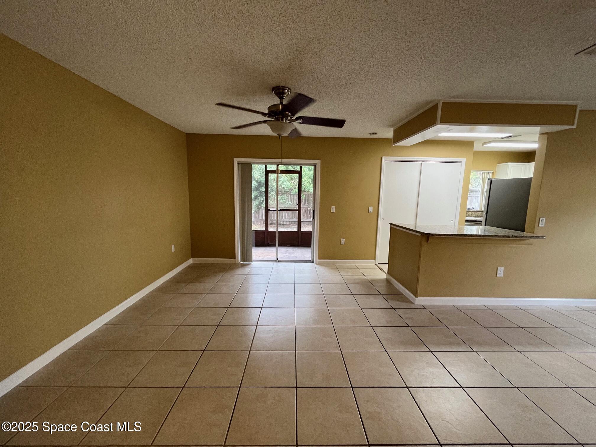 275 Spring Drive, Unit 6 Merritt Island, FL 32953 - Photo 2 of 16 Spring Dr Living Main